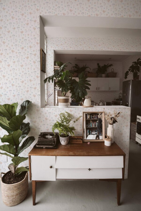 Boho style living room and kitchen decorated with Small pastel flowers peel and stick wallpaper and green plants