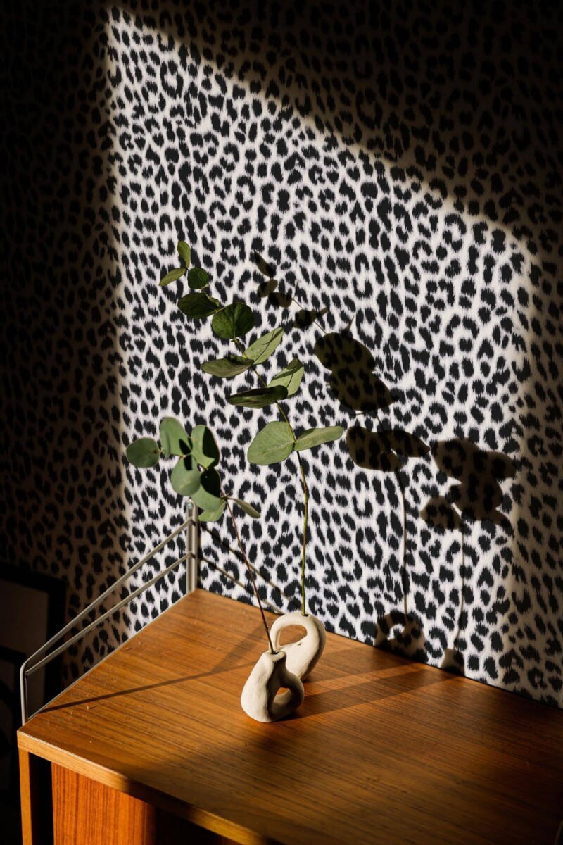 Mid-century style living room decorated with Snow leopard pattern peel and stick wallpaper