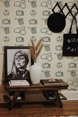 Rustic farmhouse style entryway decorated with Social media day peel and stick wallpaper