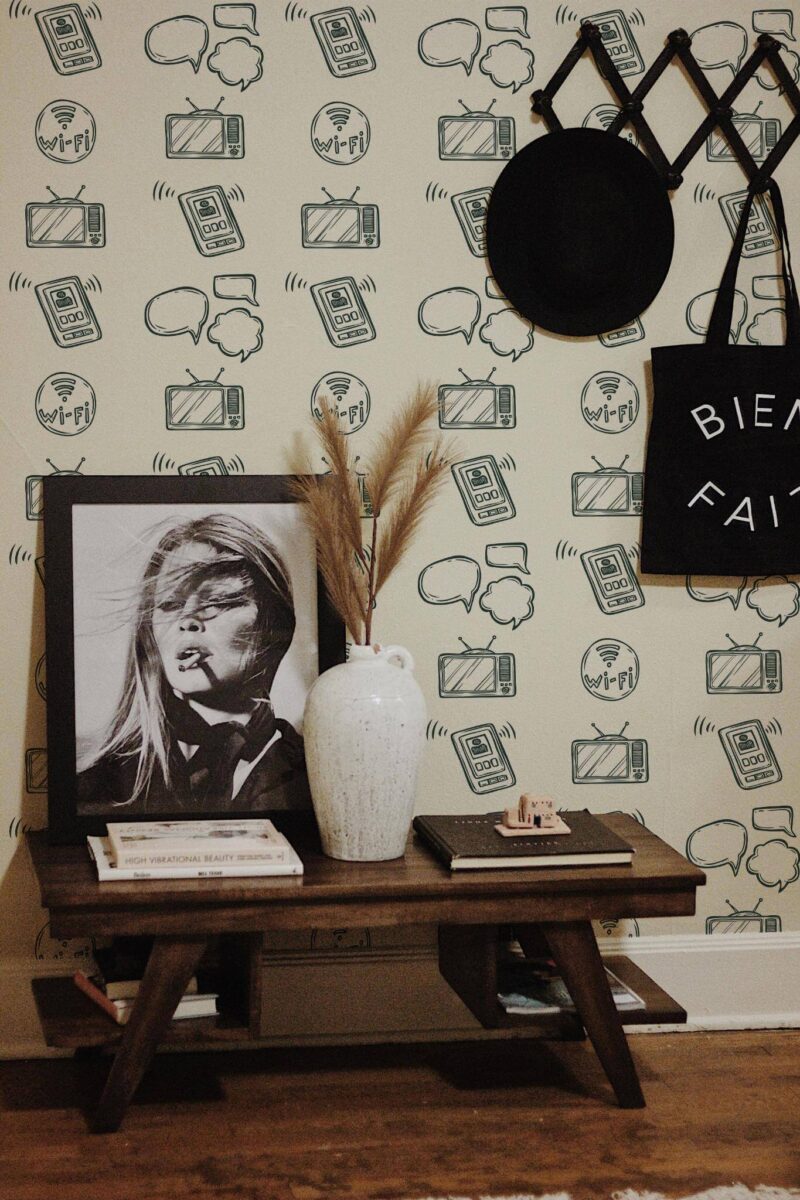 Rustic farmhouse style entryway decorated with Social media day peel and stick wallpaper