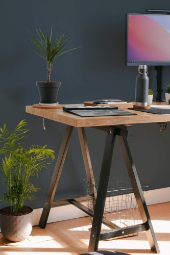 Scandinavian style home office decorated with Solid charcoal peel and stick wallpaper