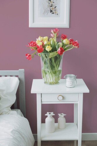 Farmhouse style bedroom decorated with Solid dusty violet peel and stick wallpaper