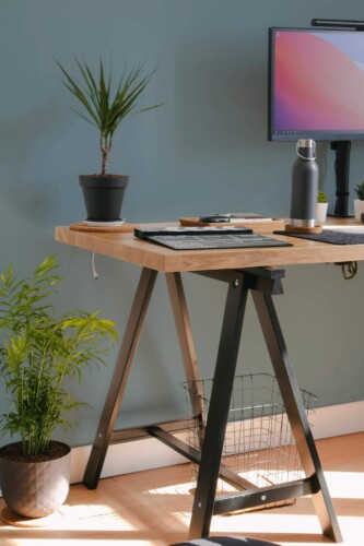 Scandinavian style home office decorated with Solid powder blue peel and stick wallpaper
