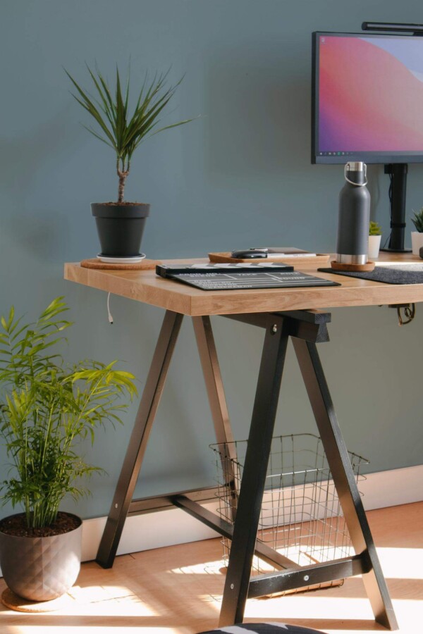 Scandinavian style home office decorated with Solid powder blue peel and stick wallpaper