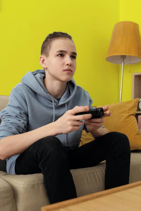 Eclectic style gaming room decorated with Solid yellow peel and stick wallpaper