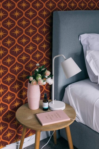 Rustic style bedroom decorated with Star ogee peel and stick wallpaper