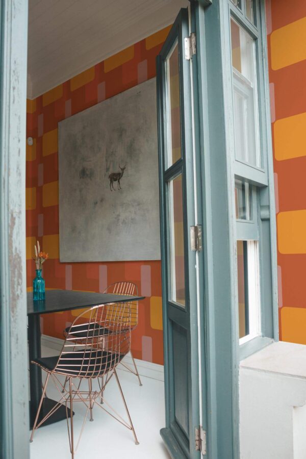 Minimal coastal style cafe decorated with Terracota geometry peel and stick wallpaper
