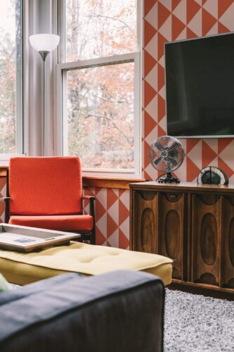 Rustic style living room decorated with Terracotta triangles peel and stick wallpaper