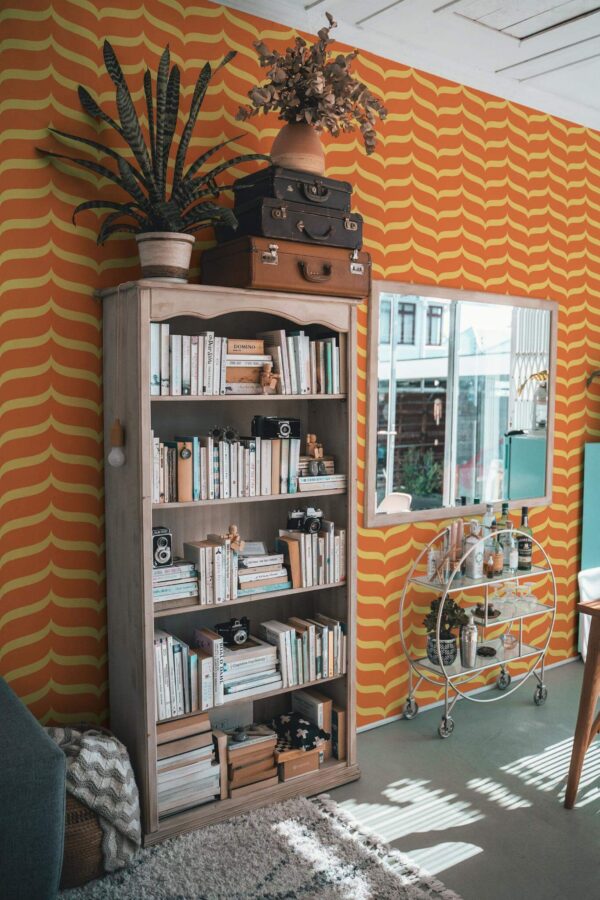 Farmhouse style living room decorated with Textile inspired retro peel and stick wallpaper