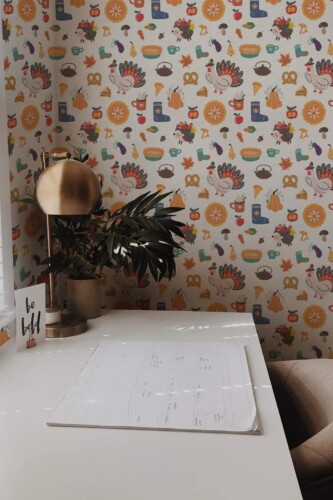 Rustic style home office decorated with Thanksgiving feast peel and stick wallpaper