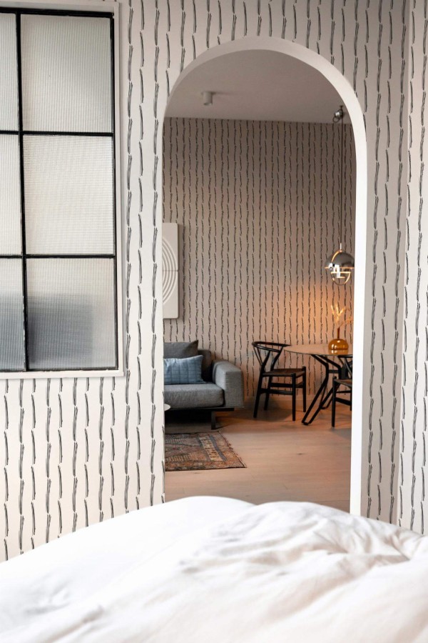 Modern scandinavian style living room decorated with Thin Brush stroke peel and stick wallpaper