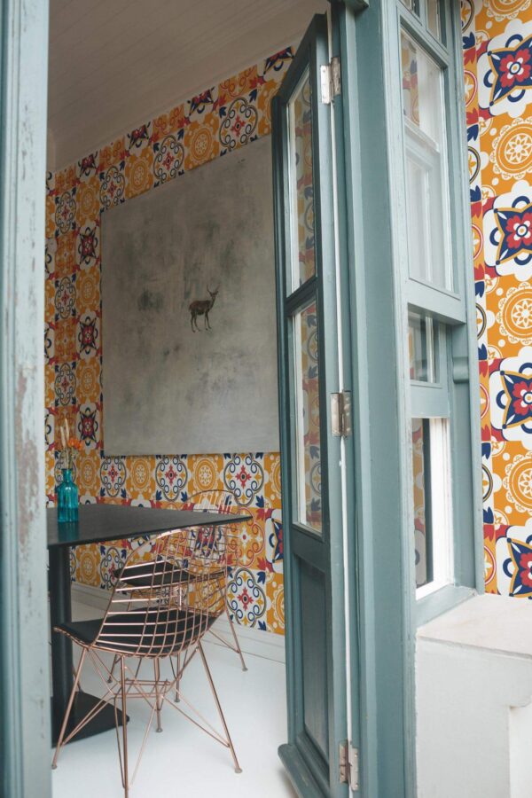 Minimal coastal style cafe decorated with Tile fireplace accent peel and stick wallpaper