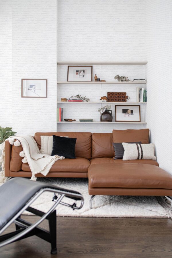 Mid-century modern style living room decorated with Tiny stripe peel and stick wallpaper