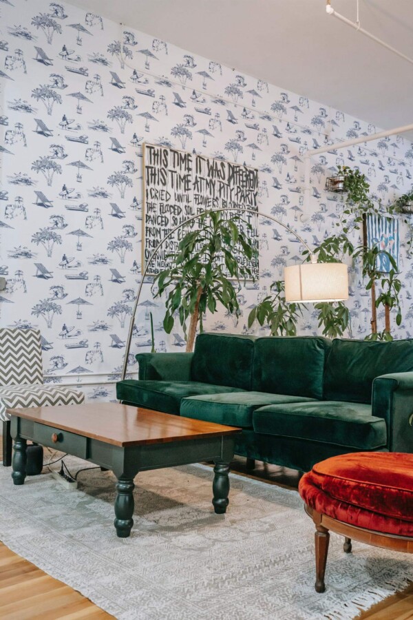 Bold eclectic style living room decorated with Toile beach peel and stick wallpaper and emerald green sofa