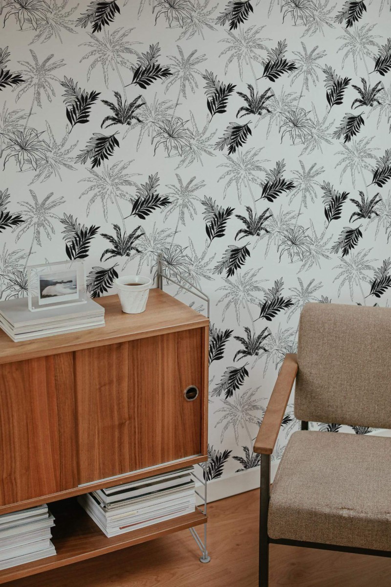 Mid-century style living room decorated with Tropical palm peel and stick wallpaper