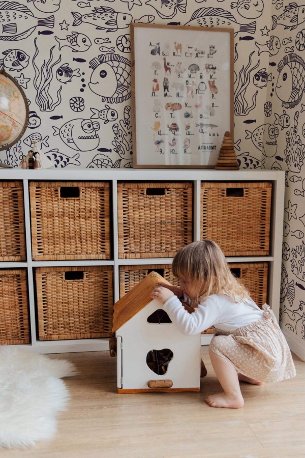 Boho gender neutral style kids room decorated with Underwater life peel and stick wallpaper