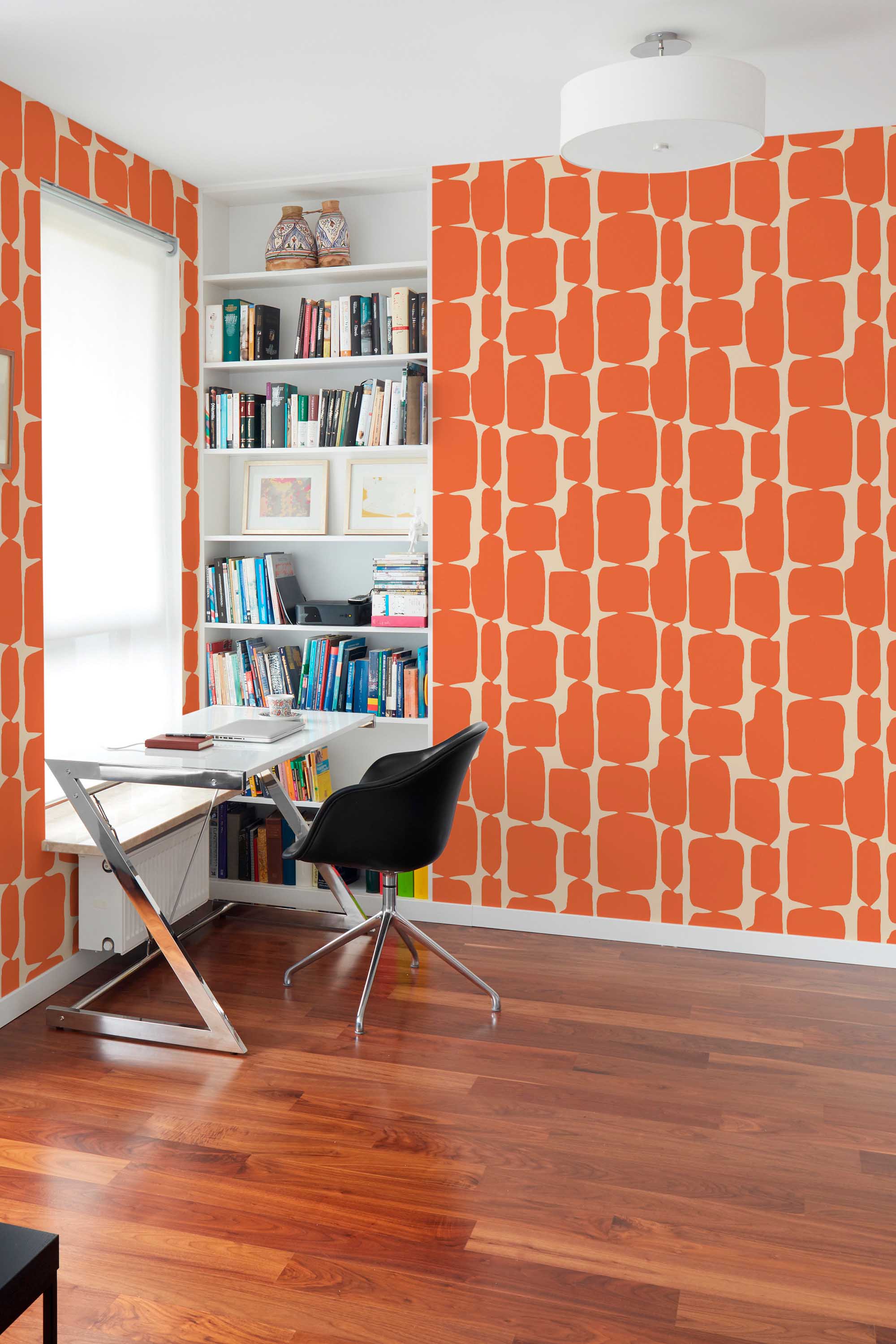 Fancy Walls self-adhesive wallpaper featuring playful orange retro geometry on a soft beige background.