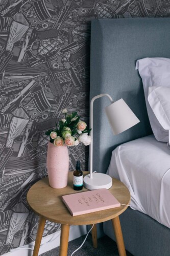 Rustic style bedroom decorated with Vintage military peel and stick wallpaper