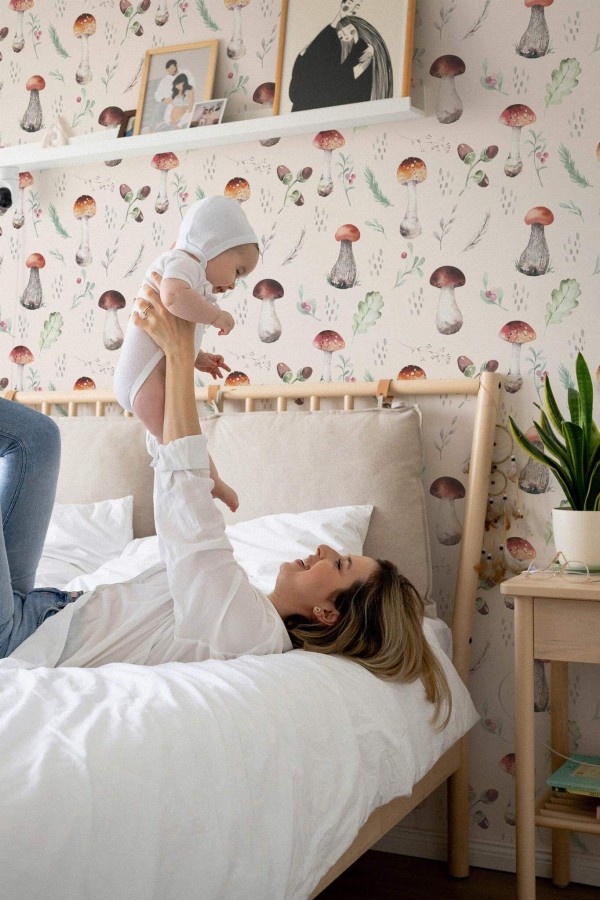 Neutral style nursery decorated with Vintage mushroom nursery peel and stick wallpaper