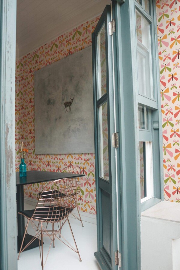 Minimal coastal style cafe decorated with Vintage nursery peel and stick wallpaper