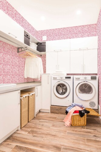 Fancy Walls peel and stick wallpaper with viva magenta brush stroke abstract pattern on white