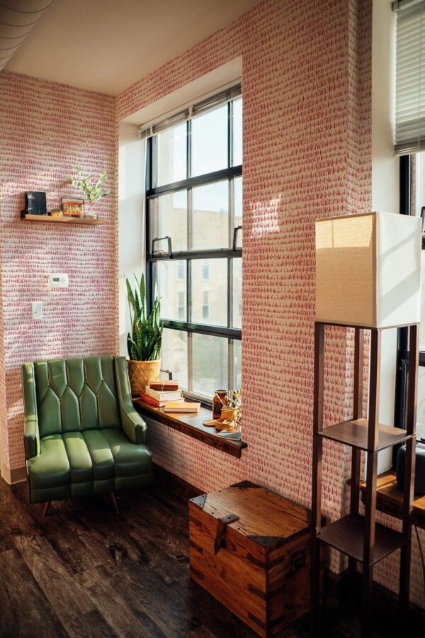 Mid-century style living room decorated with Viva magenta montezuma peel and stick wallpaper