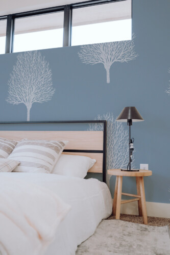 Wall mural featuring a blue and white tree from Fancy Walls