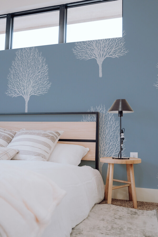 Wall mural featuring a blue and white tree from Fancy Walls