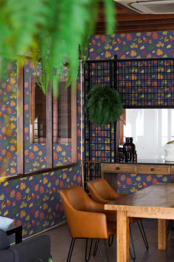 Mid-century modern style dining room decorated with Watercolor autumn leaves peel and stick wallpaper and black industrial accents