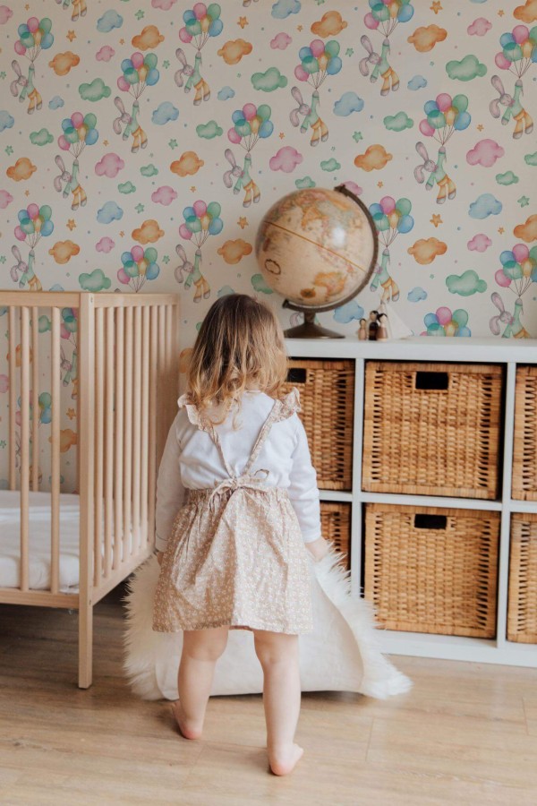 Gender neutral style kids room decorated with Watercolor bunny with balloons peel and stick wallpaper