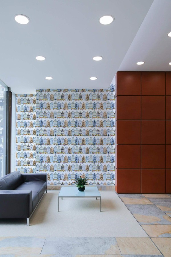 Minimal mid-century style living room decorated with Watercolor city peel and stick wallpaper