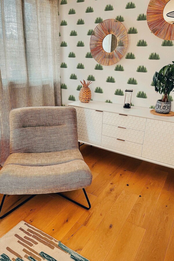 Traditional wallpaper with watercolor pines on a white backdrop from Fancy Walls