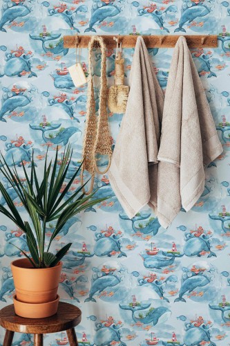 Boho style bathroom decorated with Whale nursery peel and stick wallpaper