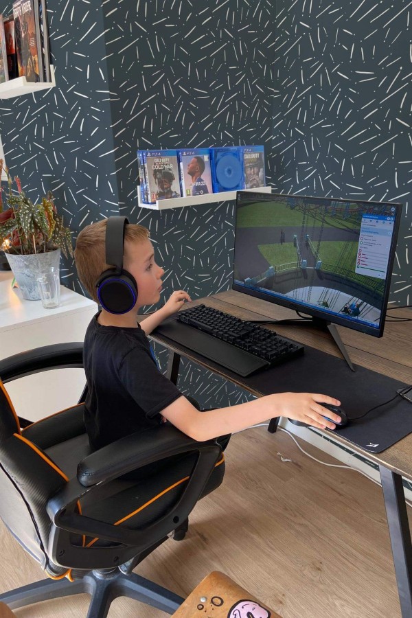 Scandinavian style gaming room decorated with Whimsical lines peel and stick wallpaper