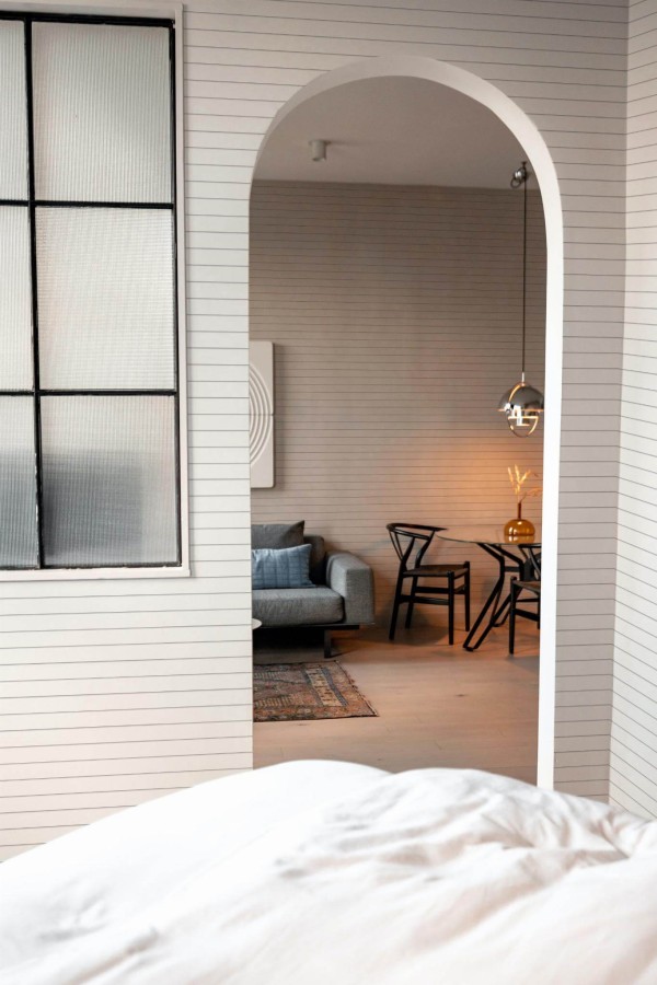 Modern scandinavian style living room decorated with White lines peel and stick wallpaper