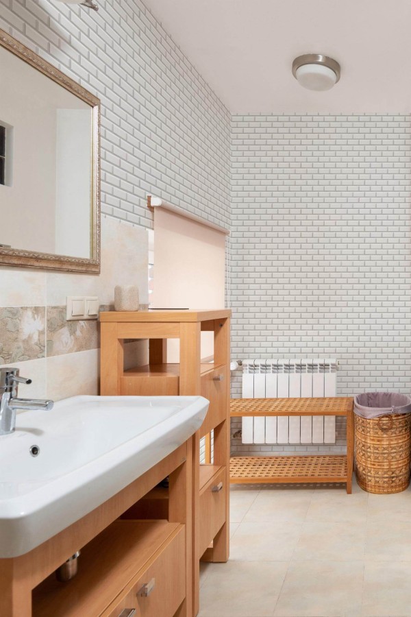 Mid-century modern style bathroom decorated with White subway tile peel and stick wallpaper