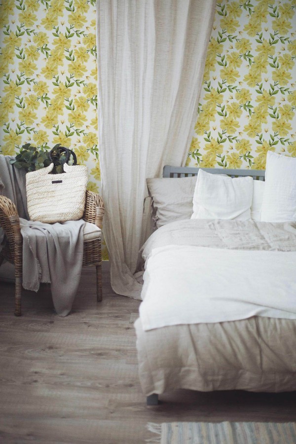 Boho style bedroom decorated with Yellow floral peel and stick wallpaper
