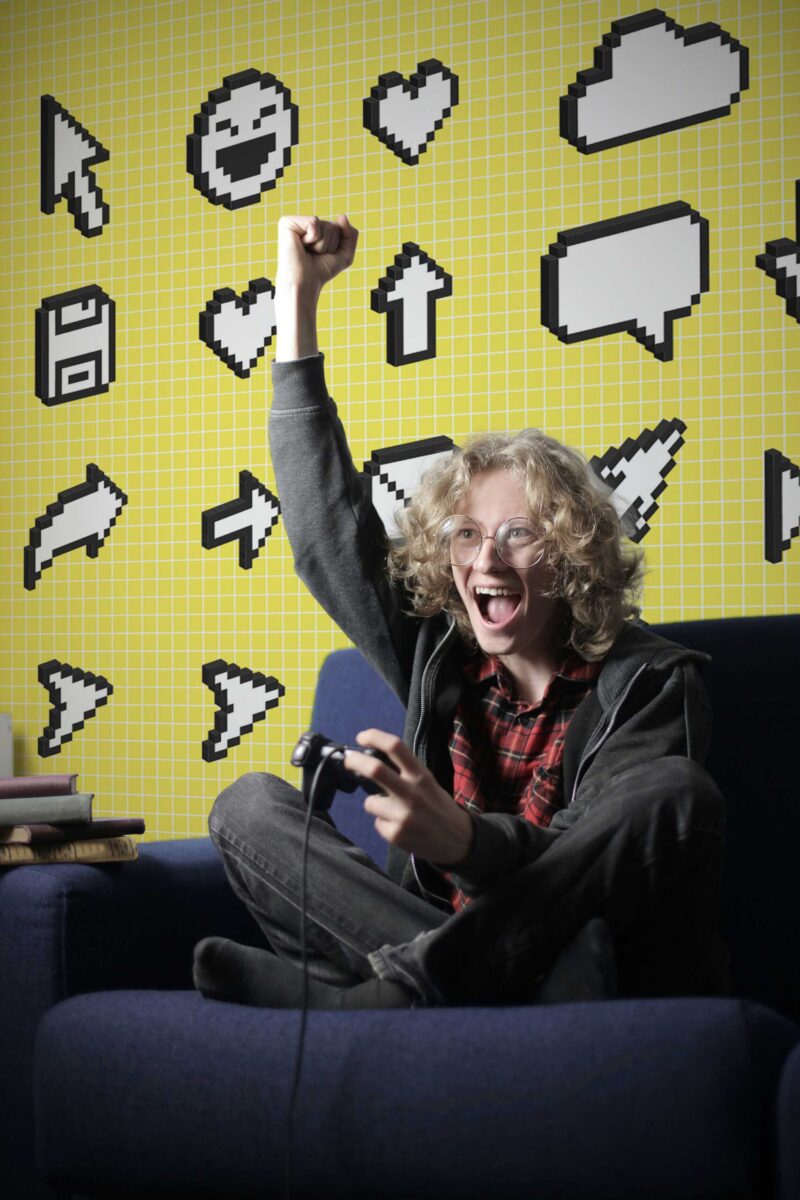 Yellow Isometric Pixel Wall Mural with white geometric pixel elements on a yellow checkered background, perfect for game rooms, creative studios, and retro-inspired spaces.