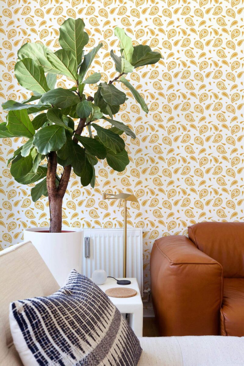 Mid-century style living room decorated with Yellow paisley peel and stick wallpaper
