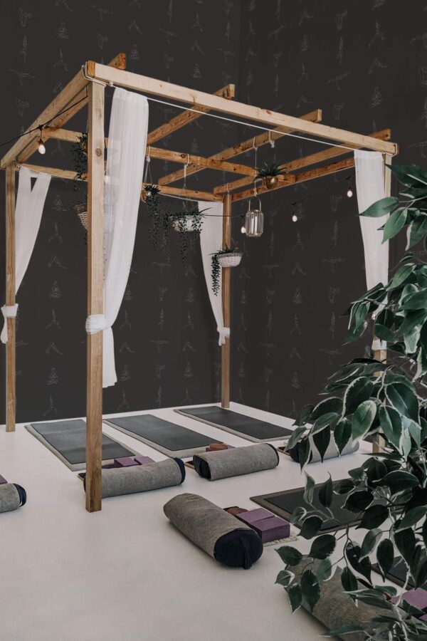 Boho style yoga room decorated with Yoga class peel and stick wallpaper
