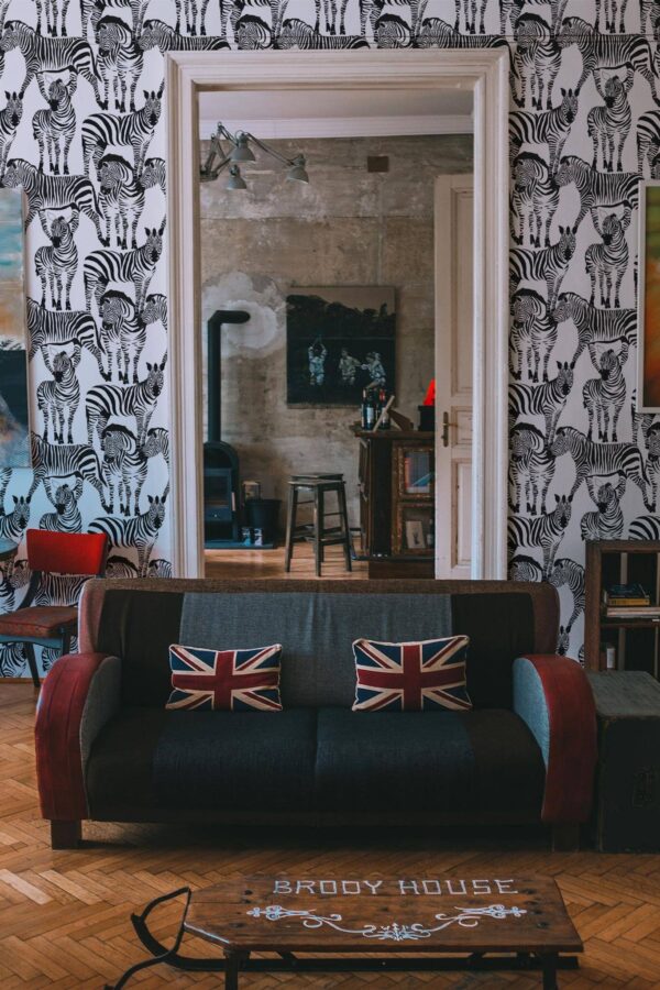 Industrial rustic style living dining room decorated with Zebras peel and stick wallpaper