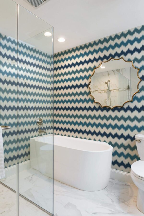 Minimal modern style bathroom decorated with Zig zag ikat peel and stick wallpaper