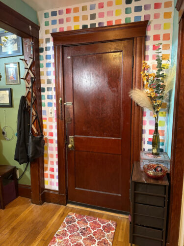 Colorful watercolor brush stroke peel and stick wallpaper installed in foyer - review picture submitted by Jurgis