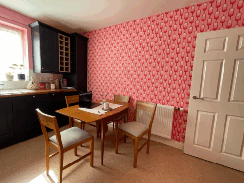 Pink Retro peel and stick wallpaper installed in kitchen - review picture submitted by Jurgis