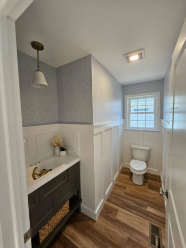Seamless waves peel and stick wallpaper installed in restroom - review picture submitted by Jurgis