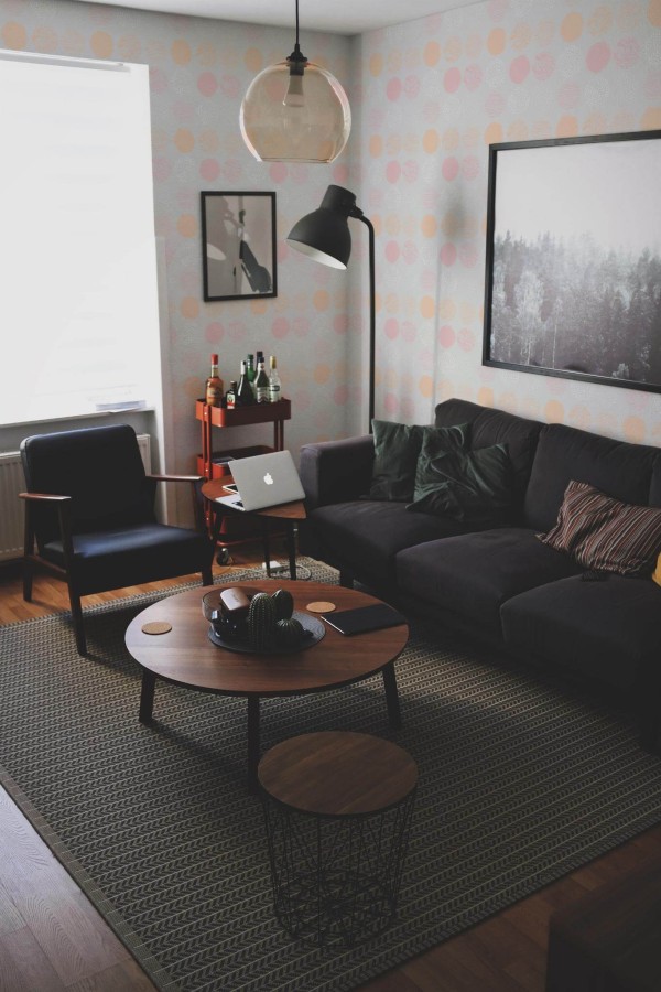 Modern dark industrial style living room decorated with Abstract circles peel and stick wallpaper