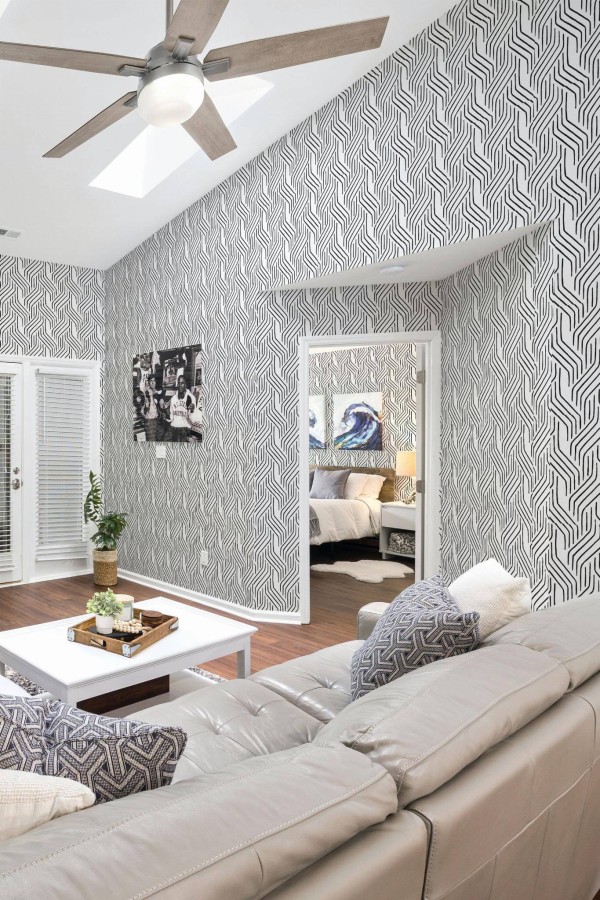 Coastal scandinavian style living room and bedroom decorated with Abstract lines peel and stick wallpaper