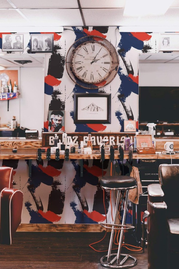 Rustic farmhouse style barber shop decorated with Abstract paint stroke peel and stick wallpaper