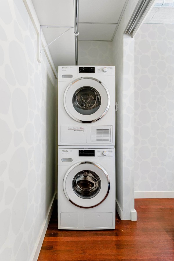 Minimalist style laundry room decorated with Abstract spots peel and stick wallpaper