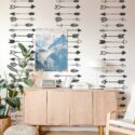Self-adhesive wallpaper with handdrawn arrow pattern from Fancy Walls
